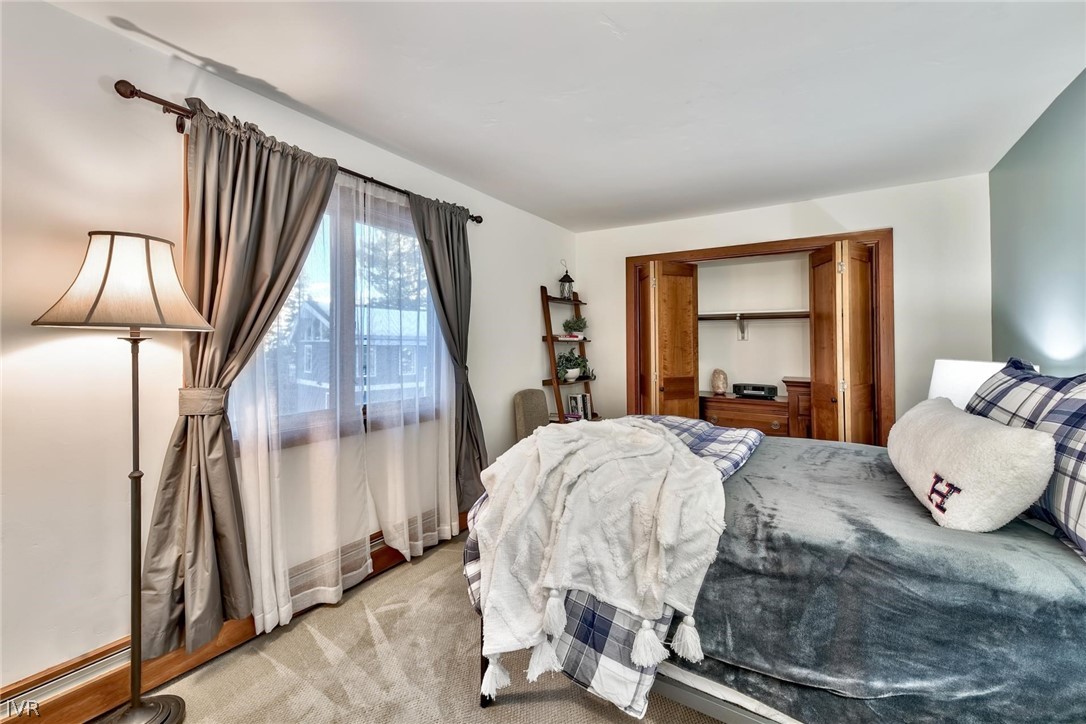 751 Tyner Way Incline Village, NV 89451 - Photo 21 of 29 a living room with a bed furniture and a window