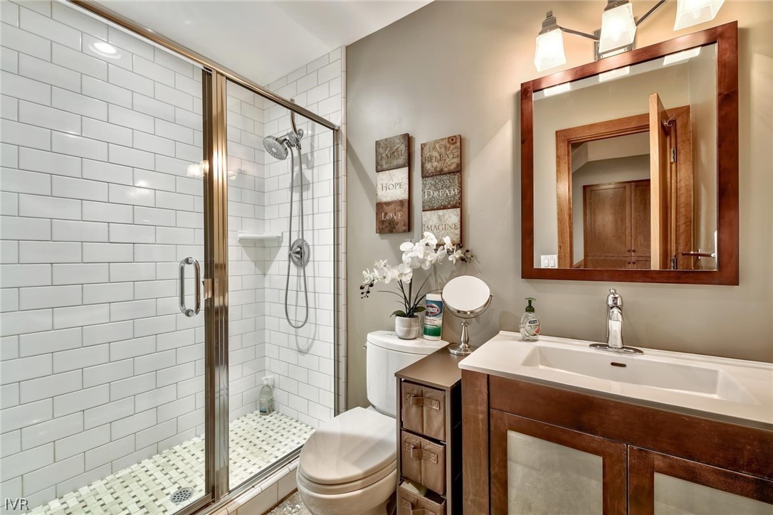 751 Tyner Way Incline Village, NV 89451 - Photo 22 of 29 a bathroom with a sink a toilet and shower