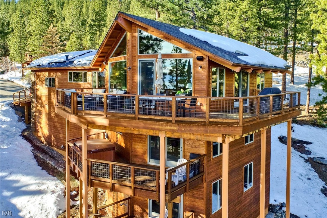 751 Tyner Way Incline Village, NV 89451 - Photo 9 of 29 a view of a house with backyard porch and sitting area