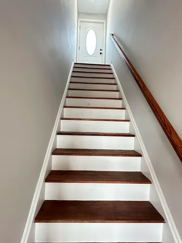 a view of balcony with wooden floor