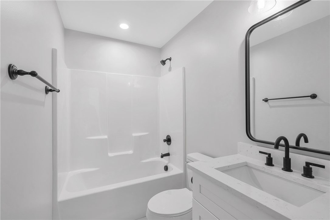 2812 Smith McGee Road Iva, SC 29655 - Photo 15 of 26 This newly updated bathroom features clean lines and modern fixtures, creating a serene and functional space.