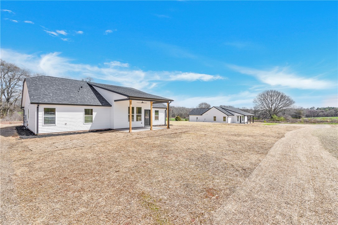 2812 Smith McGee Road Iva, SC 29655 - Photo 25 of 26 This modern home offers a serene escape with expansive outdoor living space.
