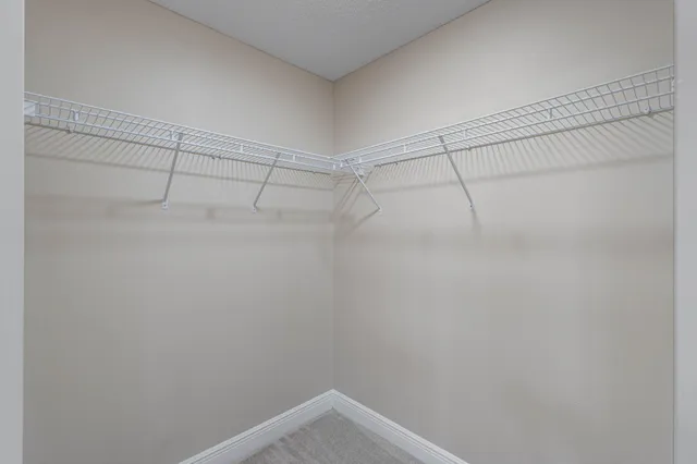 a view of a room with racks on the wall