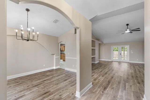 a view of a livingroom with wooden floor