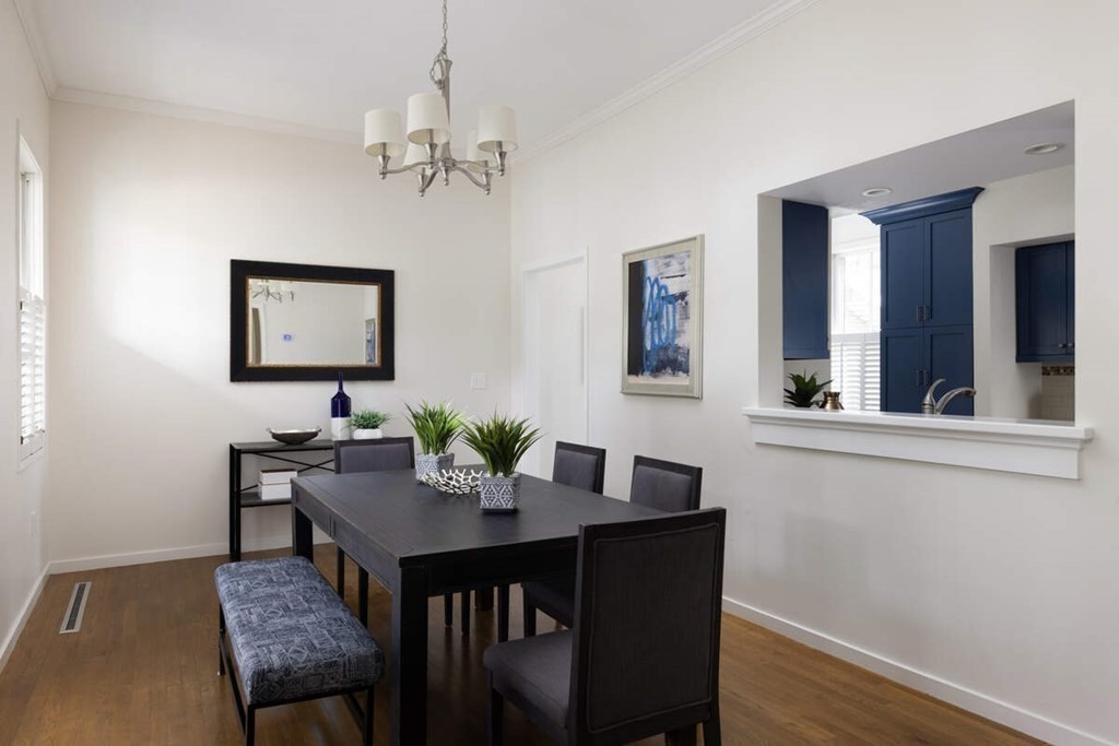 1175 Chestnut Street, Unit 2 Newton, MA 02464 - Photo 5 of 13 a view of a dining room with furniture and wooden floor