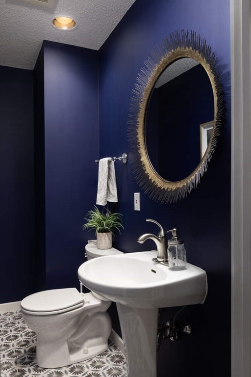 1175 Chestnut Street, Unit 2 Newton, MA 02464 - Photo 7 of 13 a bathroom with a sink and a toilet