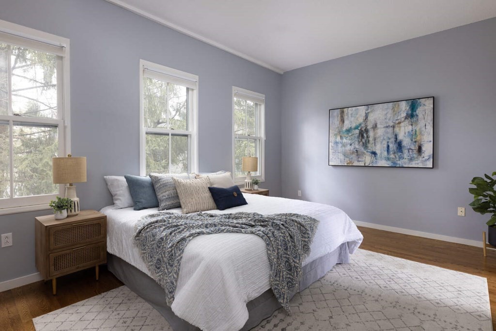 1175 Chestnut Street, Unit 2 Newton, MA 02464 - Photo 8 of 13 a bedroom with bed and a window