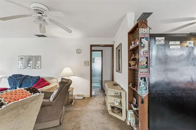 a kitchen with a sink stove and refrigerator