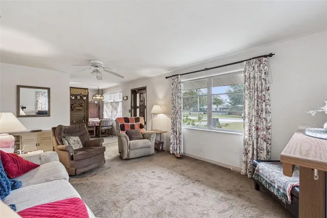 a kitchen with stainless steel appliances granite countertop a refrigerator sink and cabinets