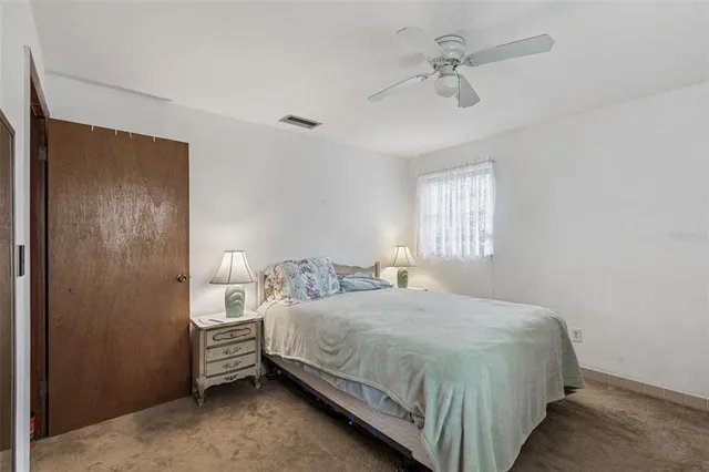 a view of a house with a yard and garage