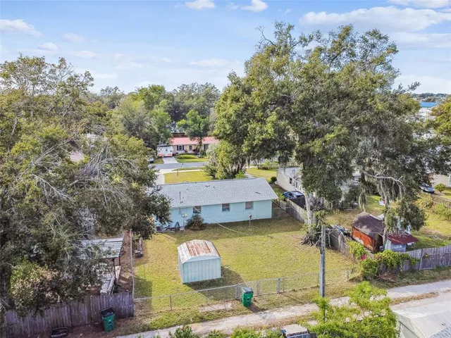 a view of swimming pool with a yard