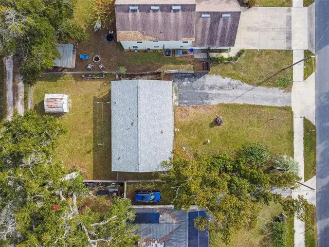 a front view of house with yard and seating area
