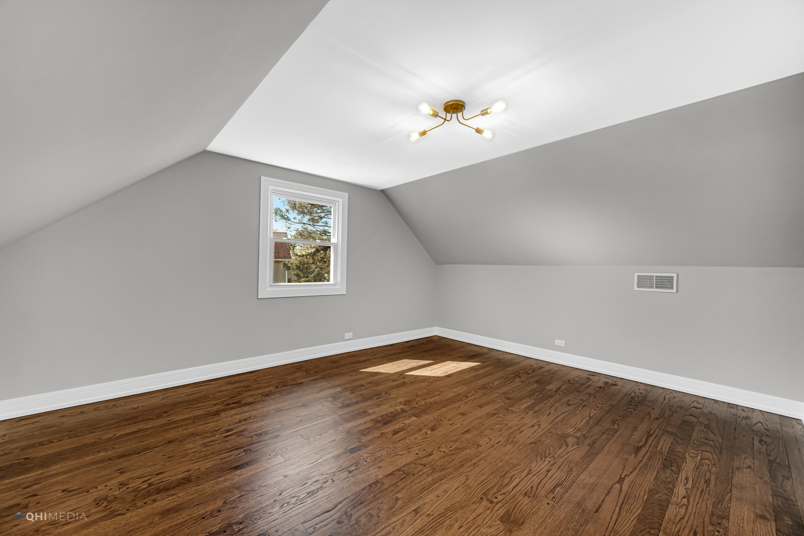 2141 Downey Road Homewood, IL 60430 - Photo 16 of 31 an empty room with wooden floor and window