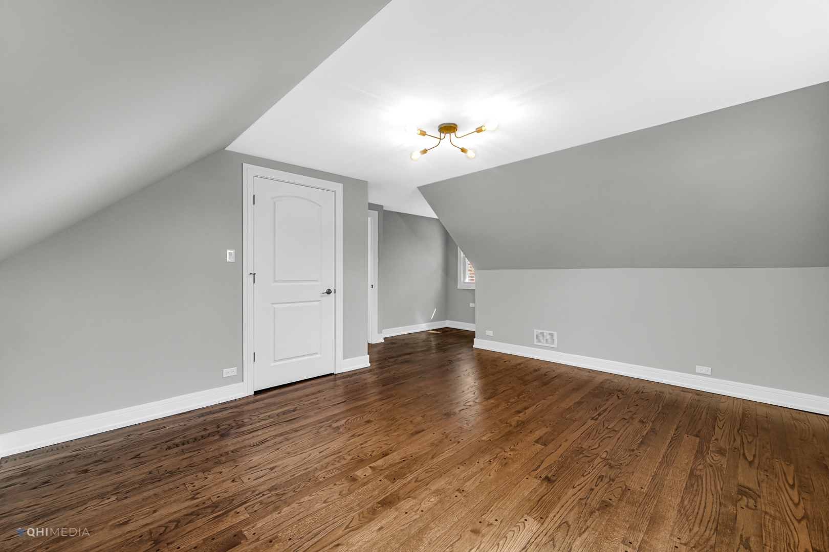 2141 Downey Road Homewood, IL 60430 - Photo 17 of 31 a view of an empty room with wooden floor and a window