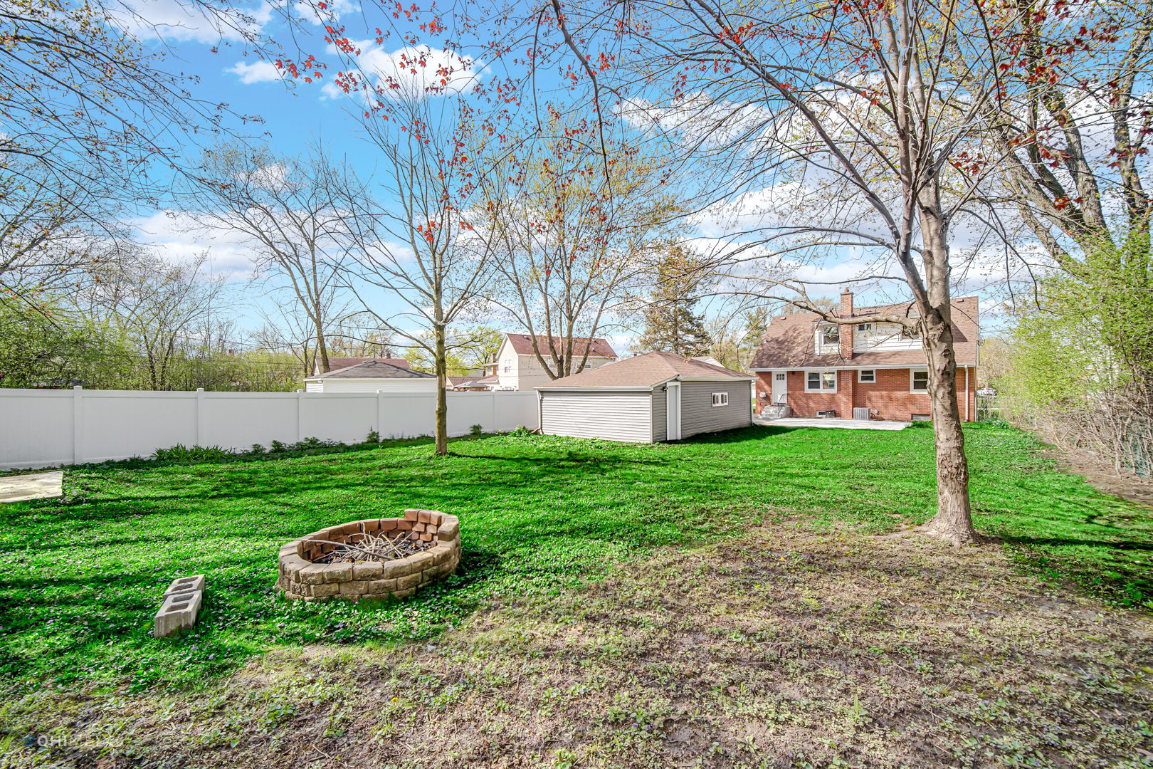 2141 Downey Road Homewood, IL 60430 - Photo 30 of 31 a view of a backyard with large trees