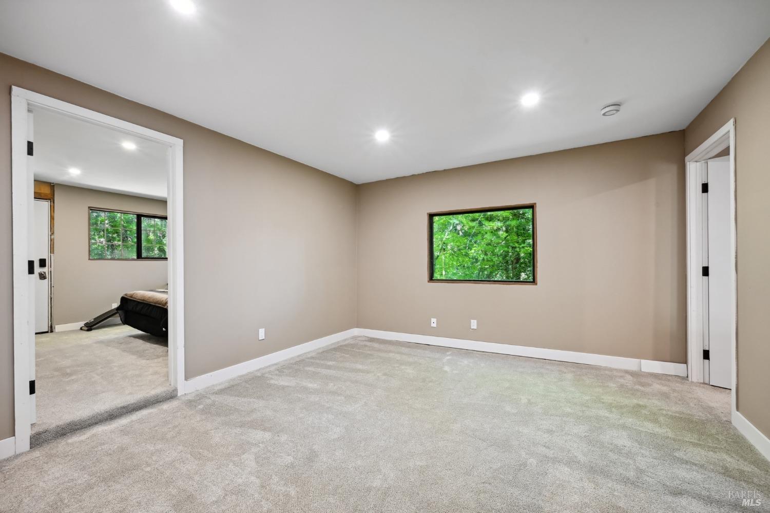 21713 Starrett Hill Drive Monte Rio, CA 95462 - Photo 34 of 50 a view of a livingroom with a ceiling fan and window
