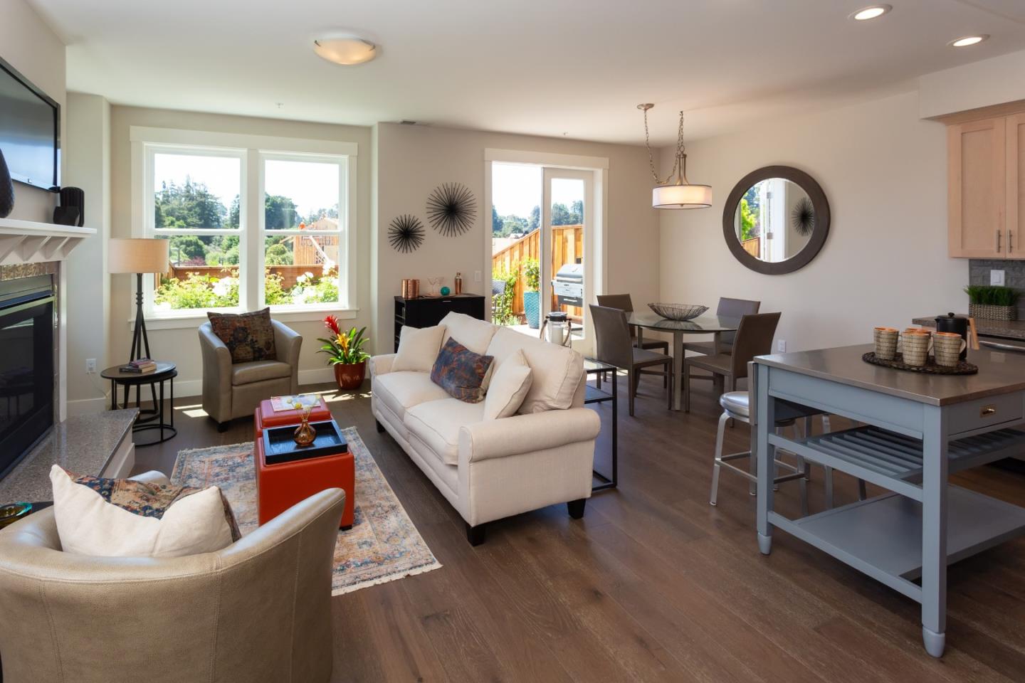 450 Granite Way Aptos, CA 95003 - Photo 11 of 37 a living room with furniture a rug and a large window