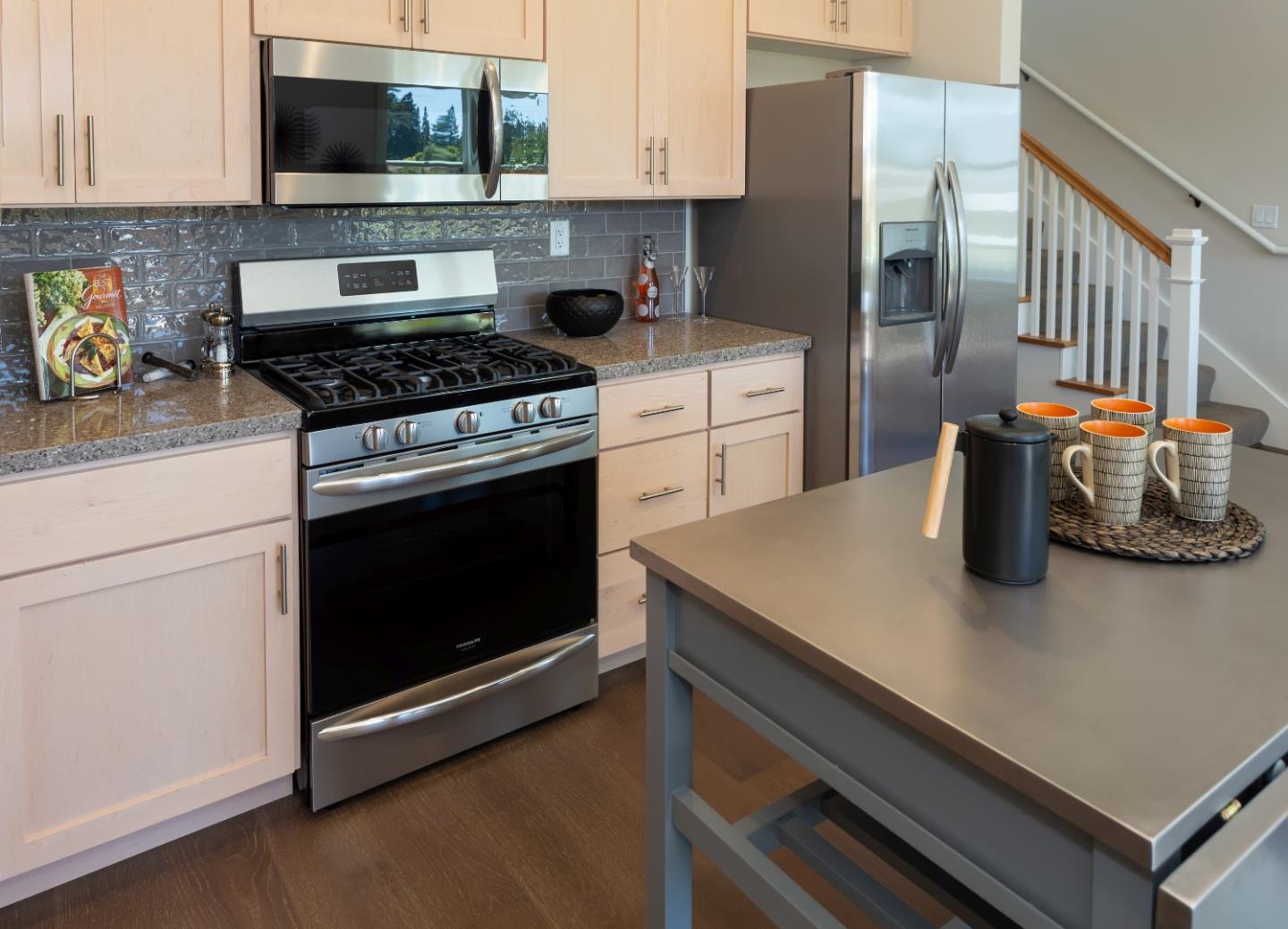 450 Granite Way Aptos, CA 95003 - Photo 18 of 37 a kitchen with a stove and a microwave