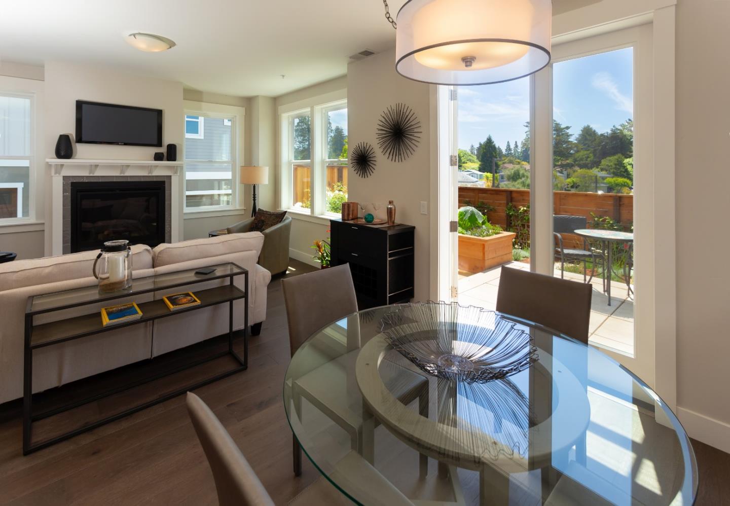 450 Granite Way Aptos, CA 95003 - Photo 19 of 37 a living room with furniture a flat screen tv and a fireplace