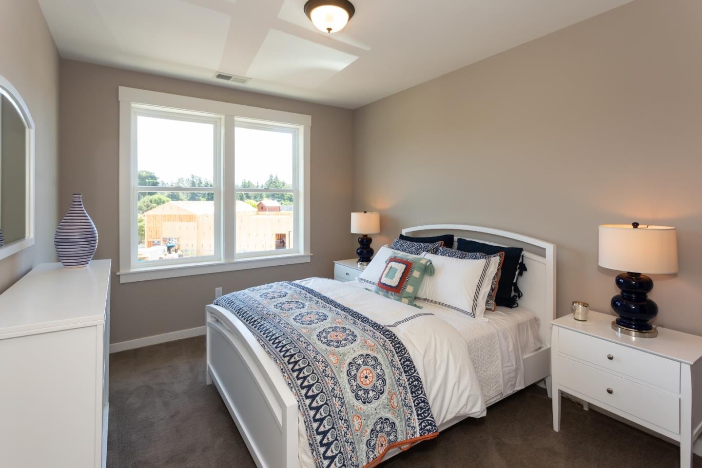 450 Granite Way Aptos, CA 95003 - Photo 32 of 37 a large bed sitting in a bedroom next to a window