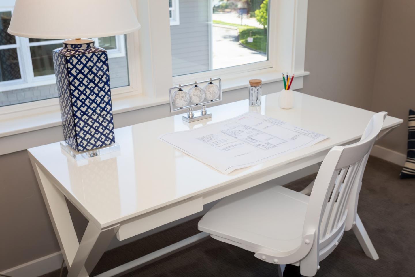 450 Granite Way Aptos, CA 95003 - Photo 34 of 37 a kitchen with a table chairs and a refrigerator