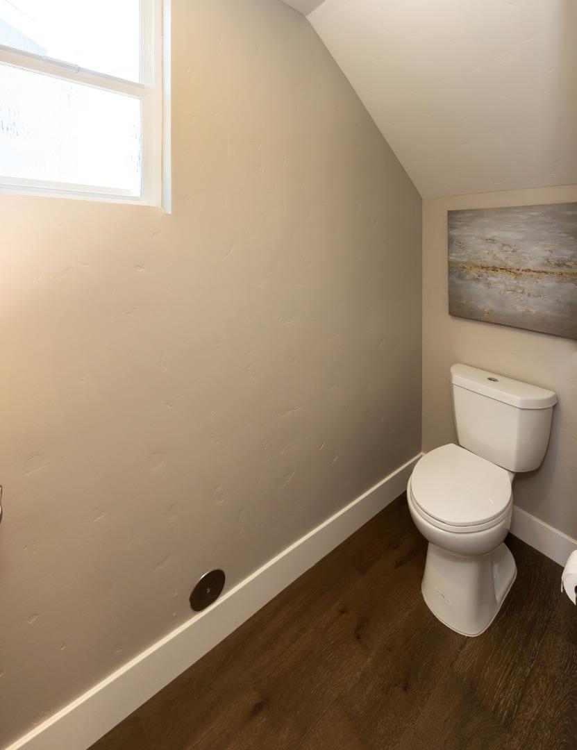 450 Granite Way Aptos, CA 95003 - Photo 7 of 37 a white toilet sitting next to a small window