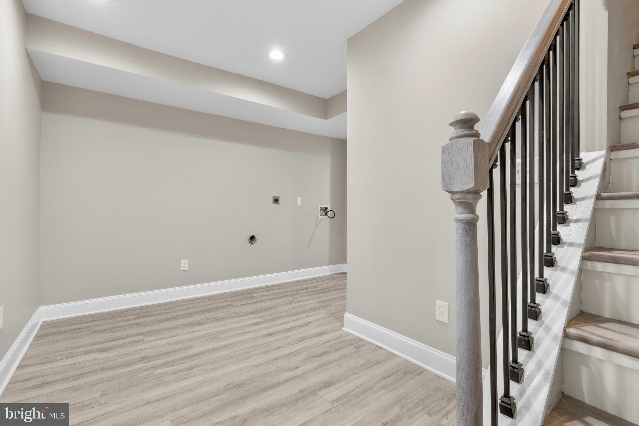 145 North Monastery Avenue Baltimore, MD 21229 - Photo 23 of 45 Spacious entryway with modern finishes.