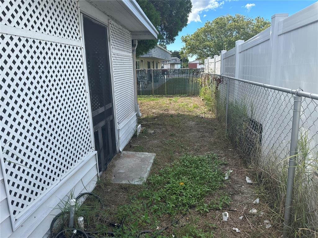 9741 Scenic Drive Port Richey, FL 34668 - Photo 15 of 17 a view of a wrought iron fences in front of house