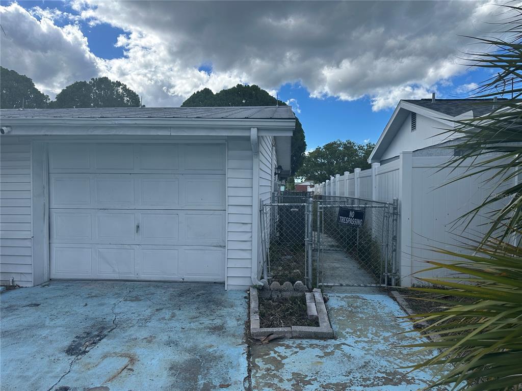 9741 Scenic Drive Port Richey, FL 34668 - Photo 3 of 17 a view of a small yard