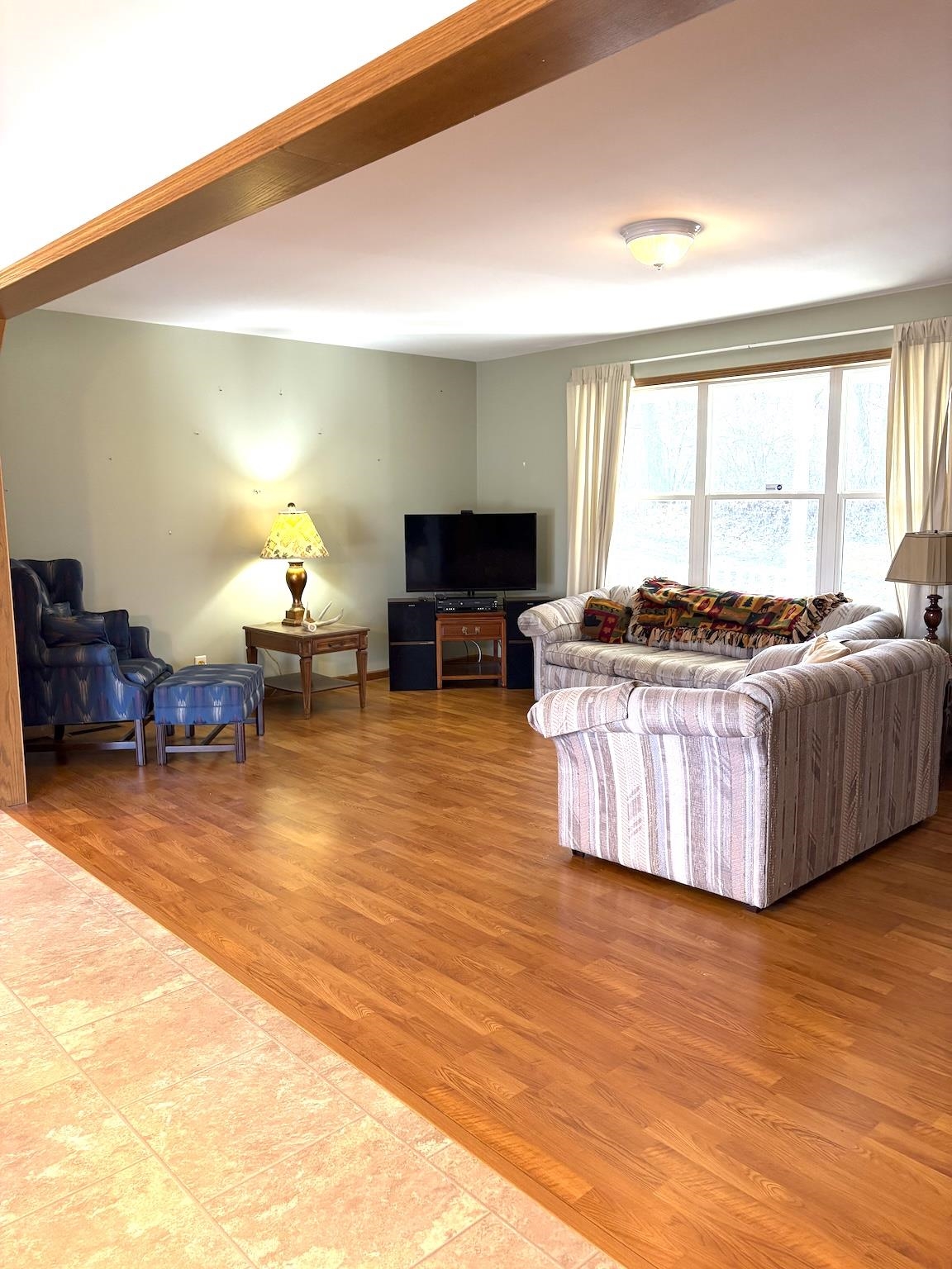 8431 Dean Road Savanna, IL 61074 - Photo 15 of 25 a living room with furniture and a flat screen tv