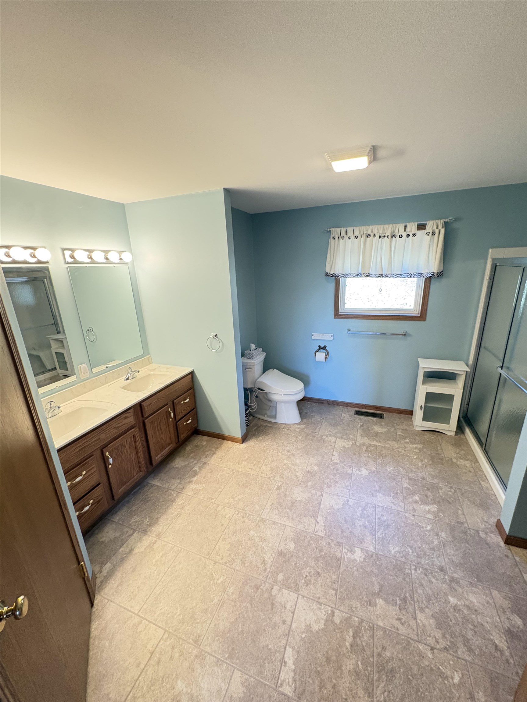 8431 Dean Road Savanna, IL 61074 - Photo 18 of 25 a bedroom with a bed and a chair