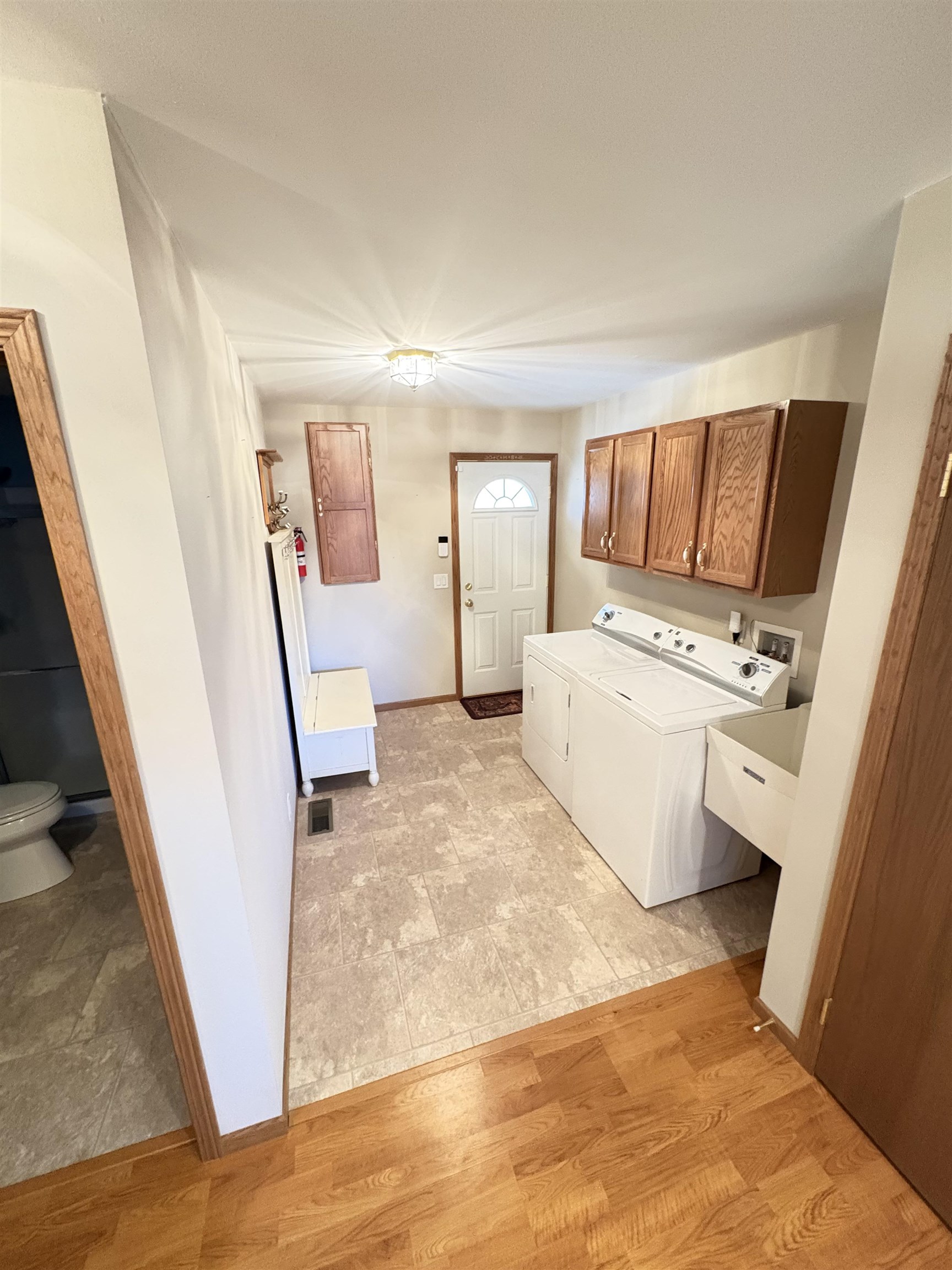 8431 Dean Road Savanna, IL 61074 - Photo 22 of 25 a view of utility room with washer and dryer