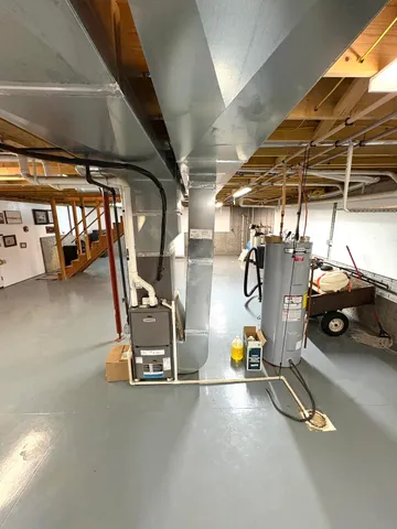 a view of a garage with cars