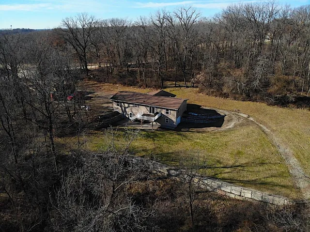 a view of a lake with a yard