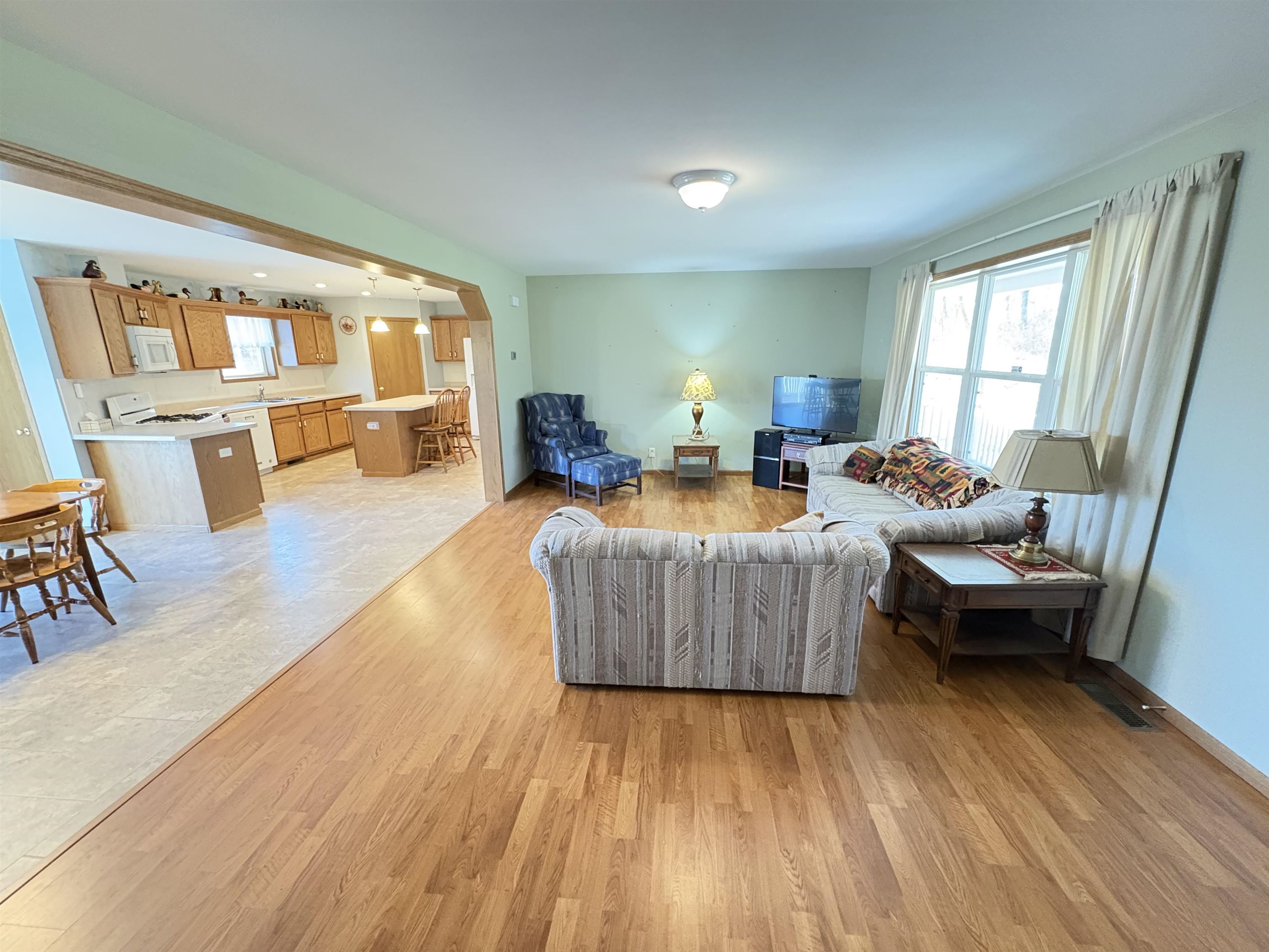 8431 Dean Road Savanna, IL 61074 - Photo 4 of 25 a living room with furniture and wooden floor
