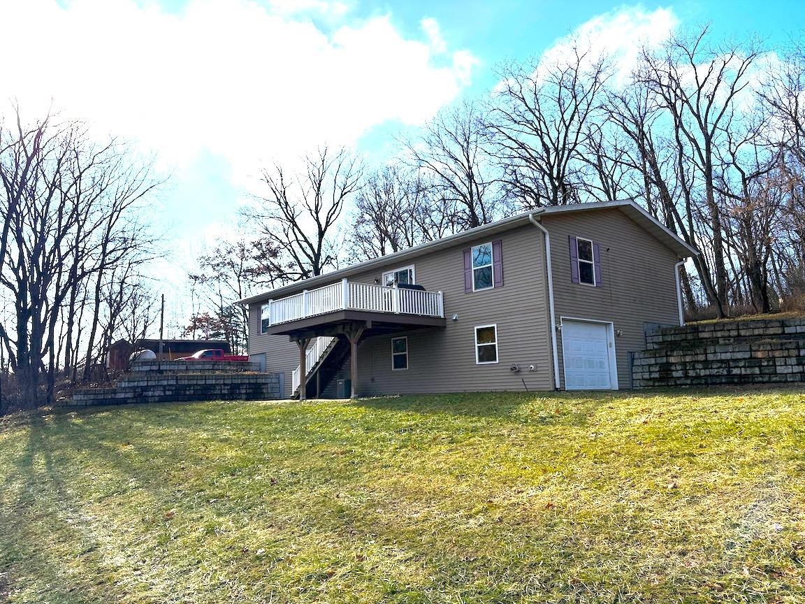 8431 Dean Road Savanna, IL 61074 - Photo 8 of 25 a front view of house with yard and trees