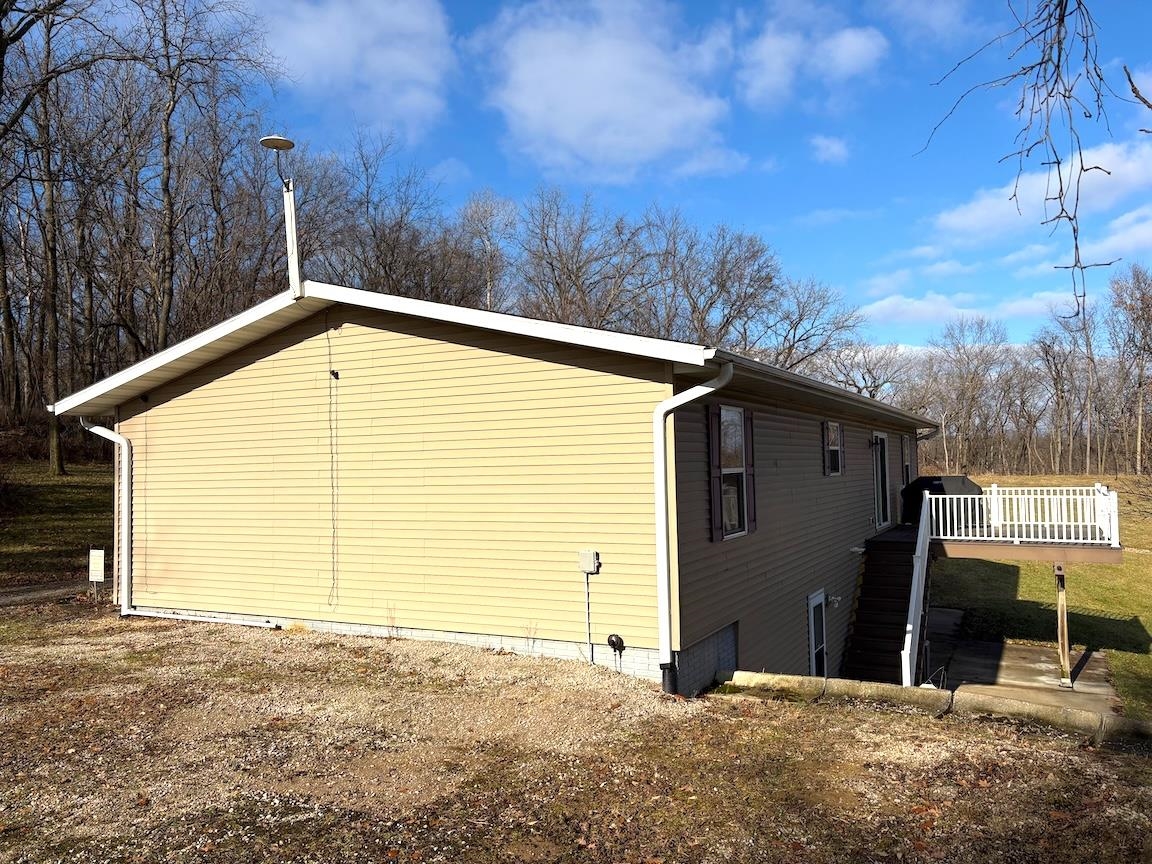 8431 Dean Road Savanna, IL 61074 - Photo 9 of 25 a view of a house with backyard