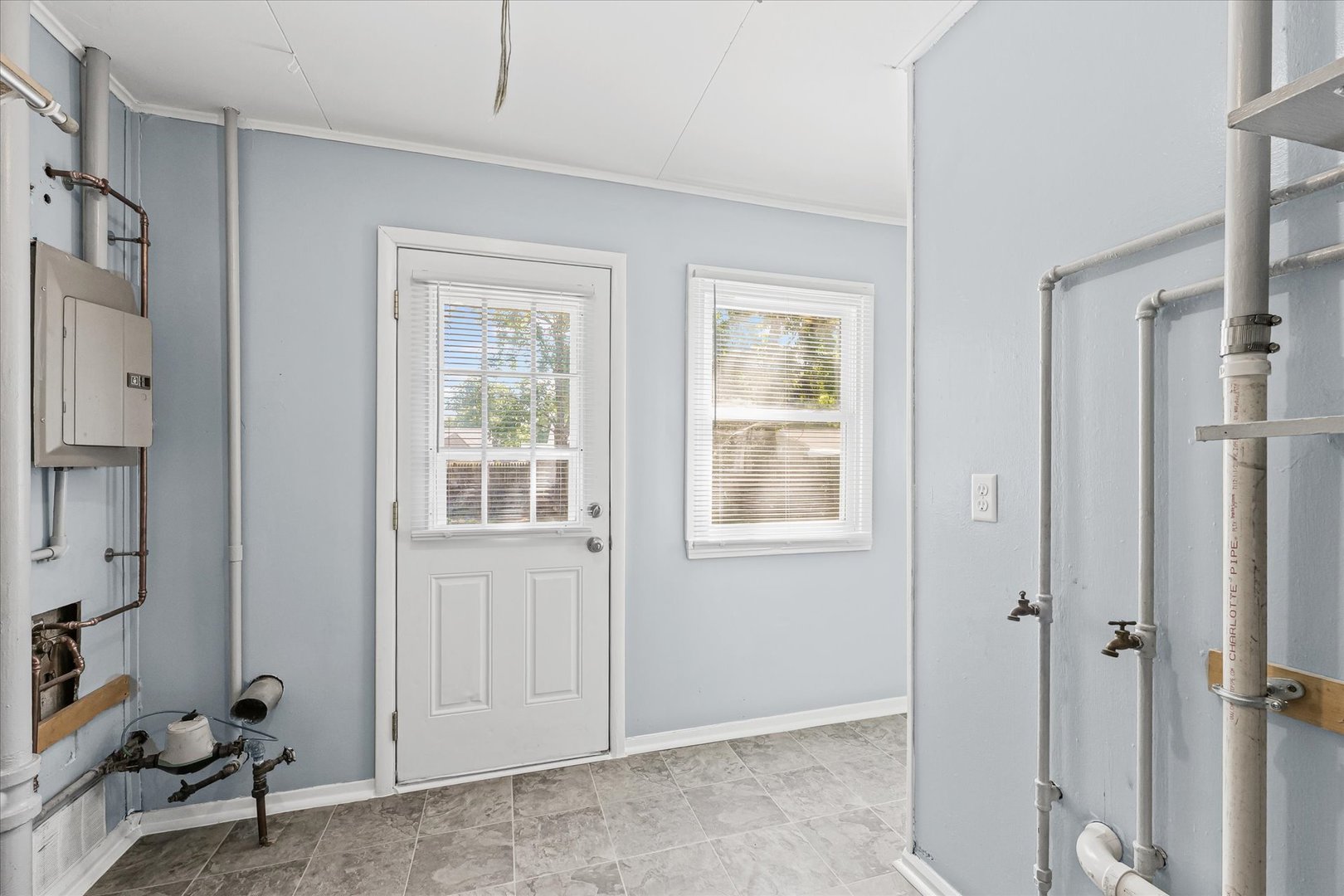 1116 Bel Aire Drive Rantoul, IL 61866 - Photo 15 of 27 a view of an empty room with a window