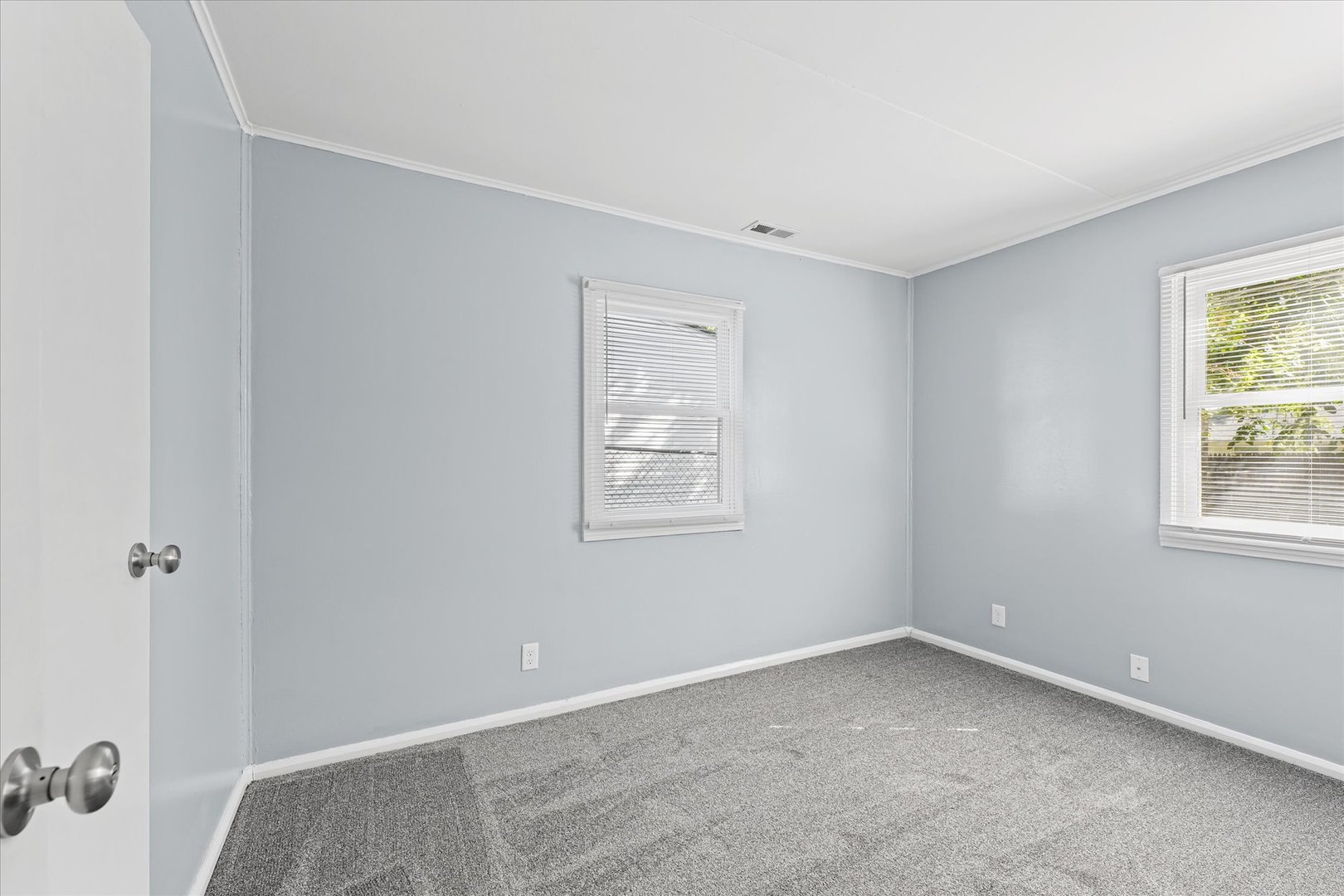 1116 Bel Aire Drive Rantoul, IL 61866 - Photo 17 of 27 an empty room with a window