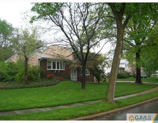 11 Perry Road East Brunswick, NJ 08816 - Photo 5 of 6 a front view of a house with garden