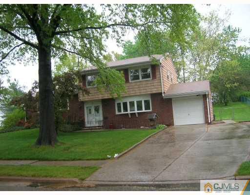 11 Perry Road East Brunswick, NJ 08816 - Photo 6 of 6 a front view of a house with a garden