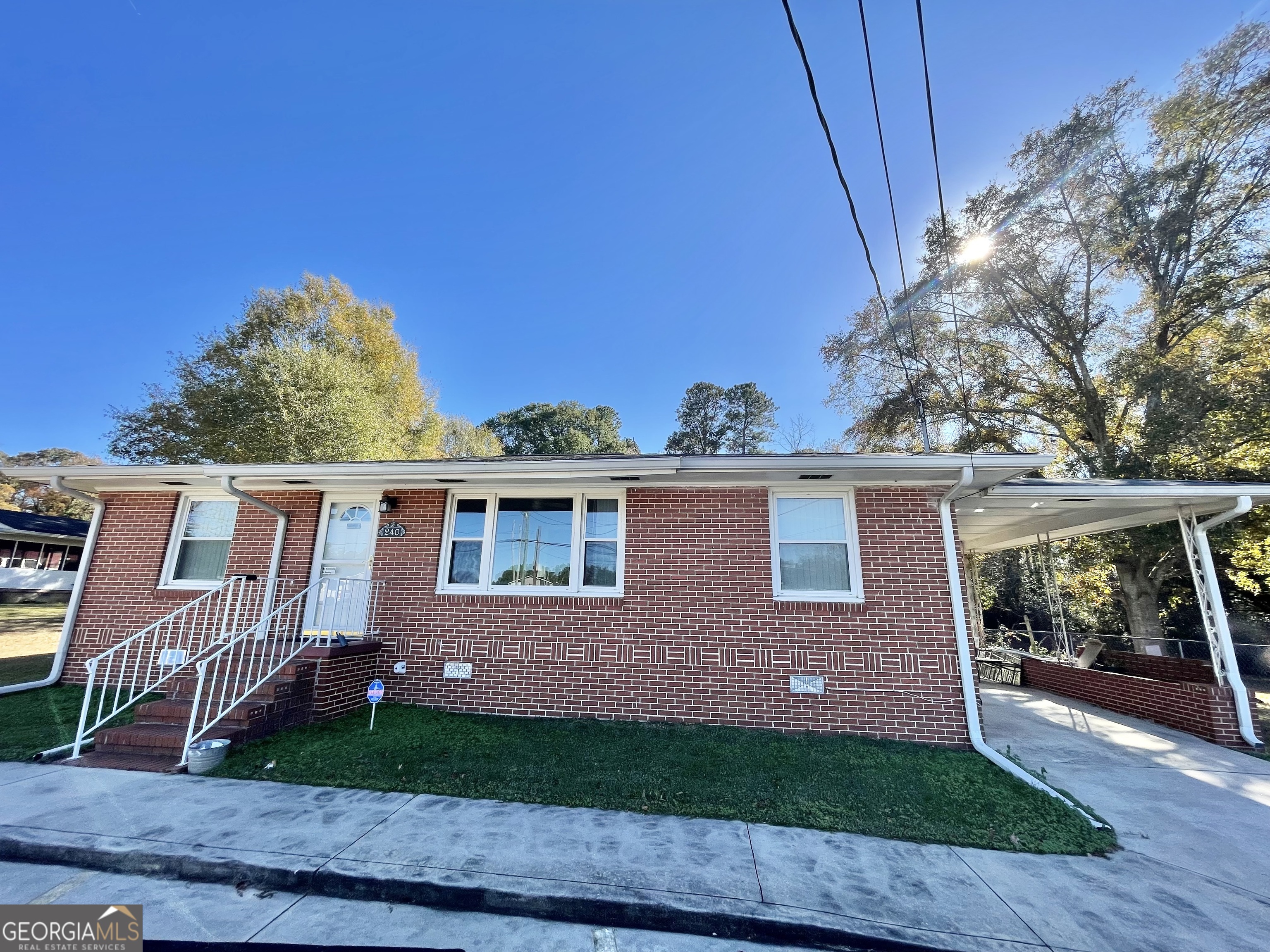 220 Airport Road Griffin, GA 30223 - Photo 1 of 23 a view of backyard with a garden and plants