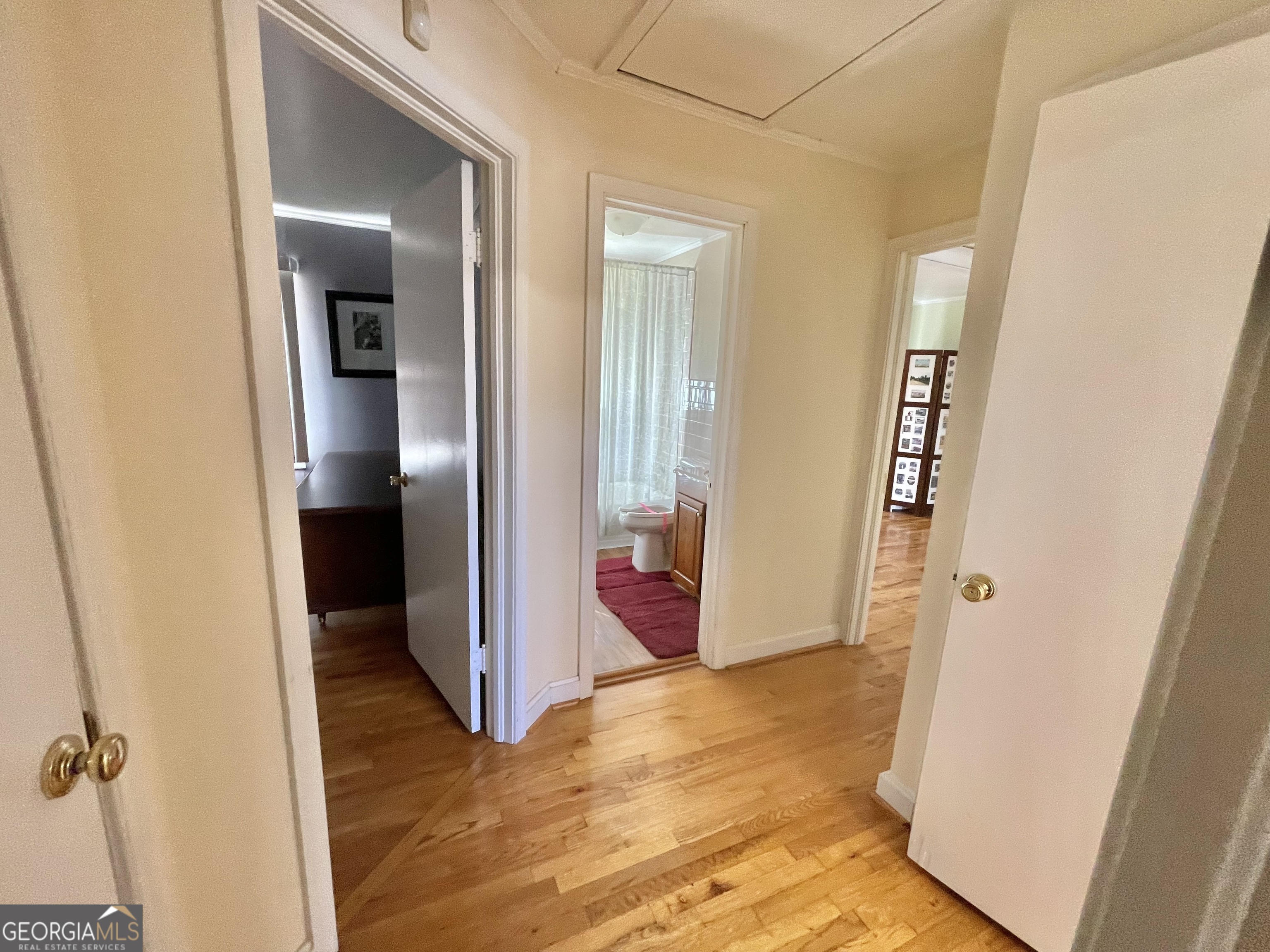 220 Airport Road Griffin, GA 30223 - Photo 18 of 23 wooden floor in a gallery