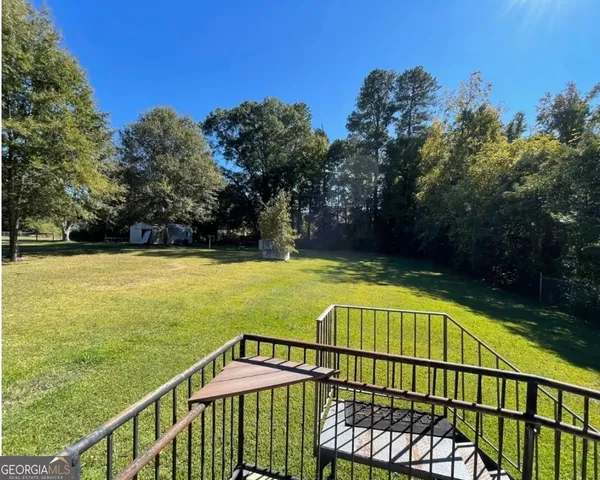 a view of a swimming pool with a slide