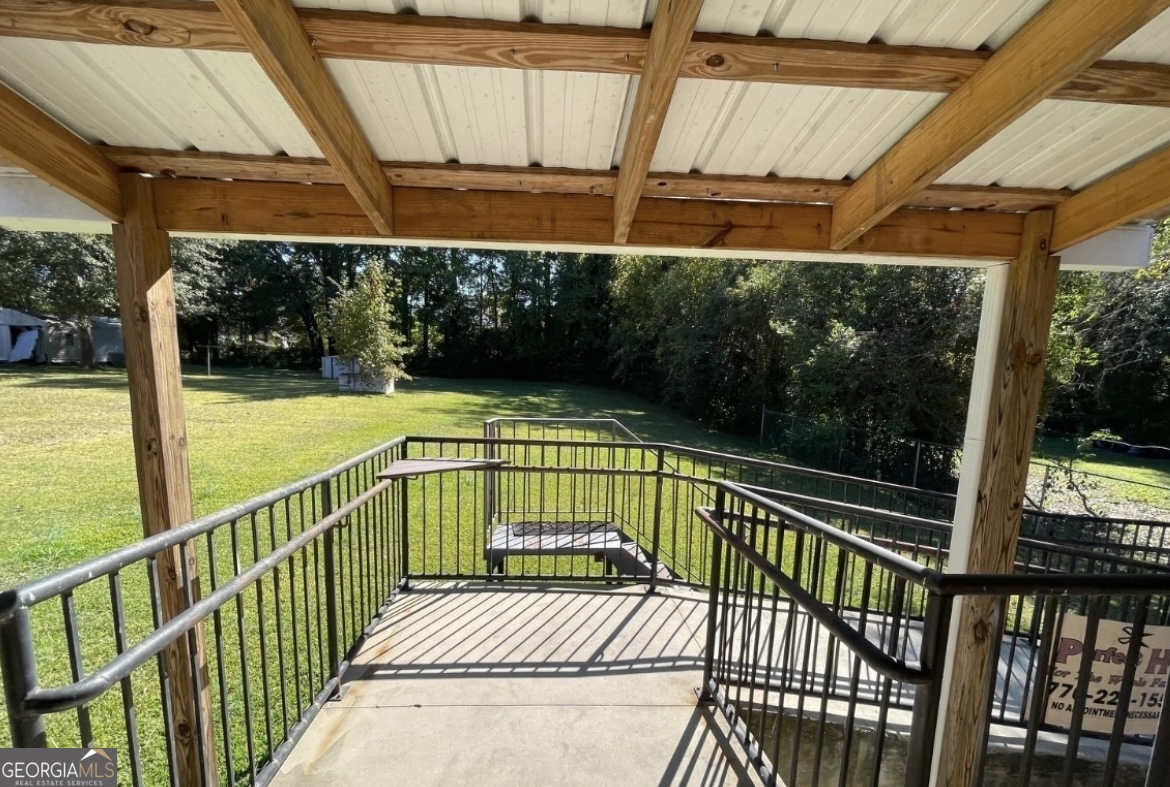 220 Airport Road Griffin, GA 30223 - Photo 21 of 23 a view of balcony with wooden floor