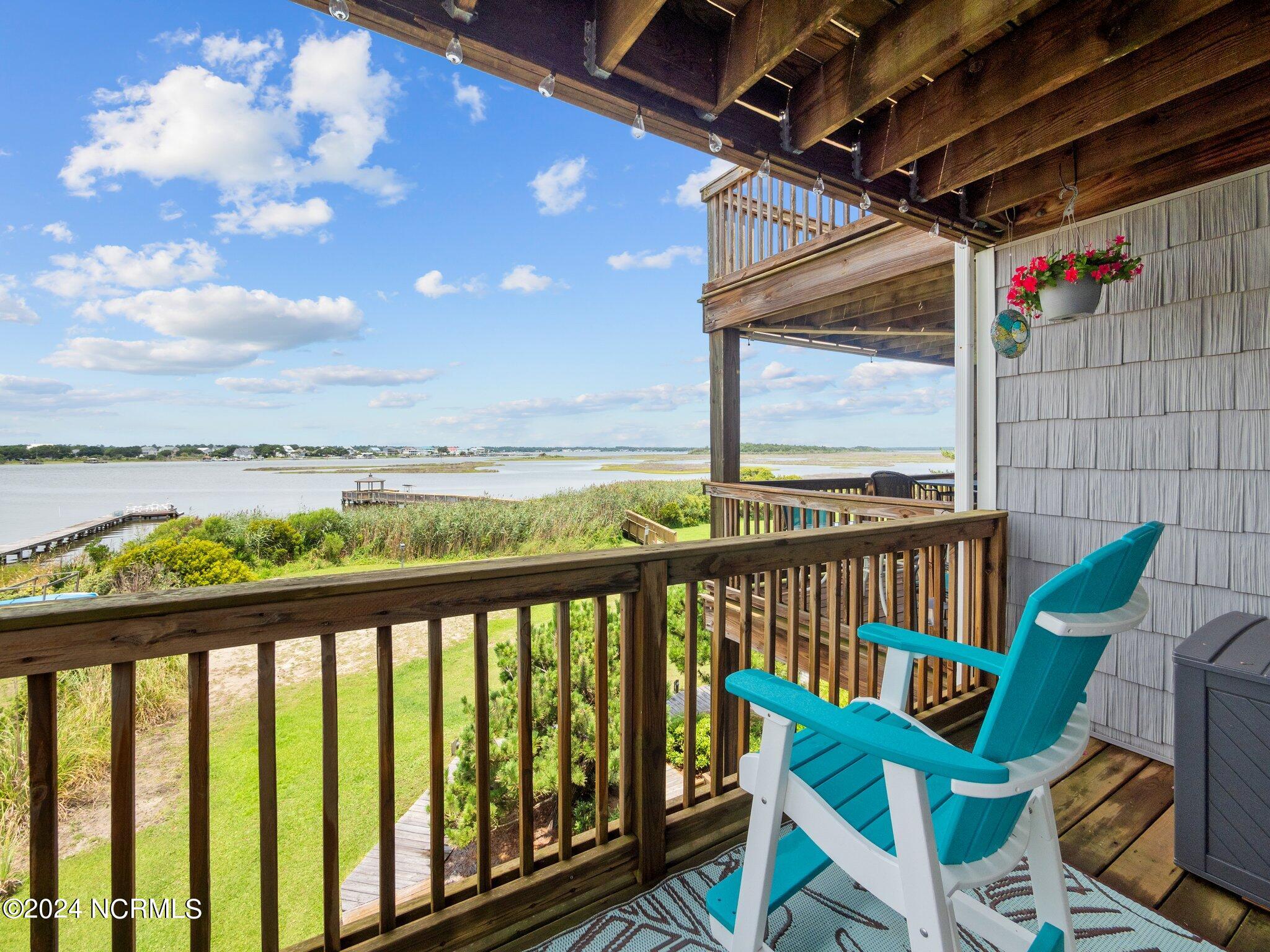 1771 New River Inlet Road, Unit 1 North Topsail Beach, NC 28460 - Photo 12 of 49 Guest Bedroom Balcony