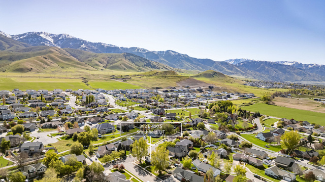 892 East 400 South Smithfield, UT 84335 - Photo 42 of 44 Aerial view of residential area featuring a mountainous background