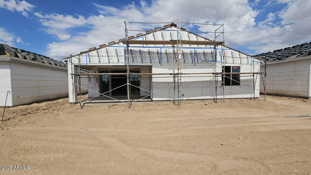 2044 Night Rider Road San Tan Valley, AZ 85140 - Photo 5 of 17 a view of a house with a garage