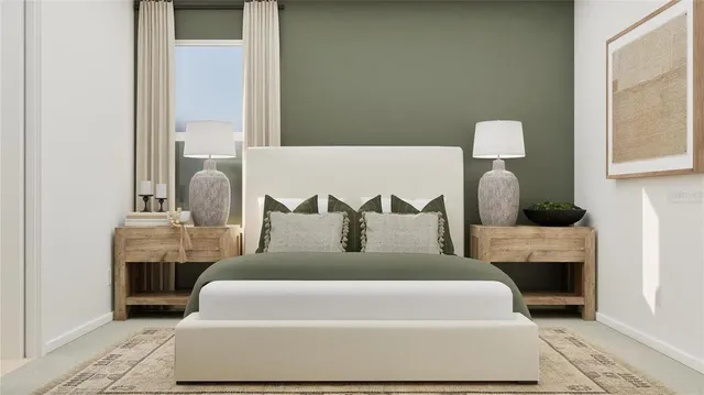 a large bed sitting in a bedroom next to a window with flowerpot