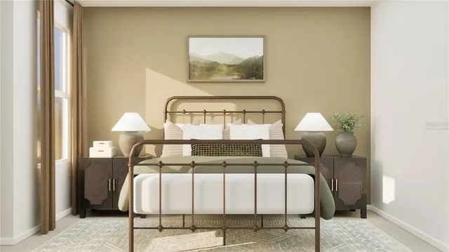 a bed sitting in a bedroom next to a window